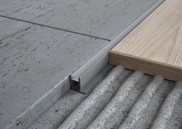 Profilo a giunto dilatazione in pvc con silicone grigio e trasparente per pavimenti. Barra 2 m